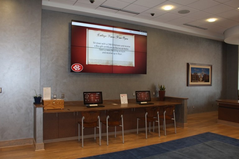 digital signage solutions, digital signs, bank digital signage, bank signage, banking signage, bank digital signs, digital signage bank, CNB, Canandaigua National Bank, NY, NY bank, Canandaigua National Bank & Trust, Canandaigua National Bank signage, framed digital signage, wooden enclosure signs, video wall, bank video wall, 4x4 video wall, credit union video wall, Credit union digital signage, Credit Union digital signs, digital signage in Credit Union, financial institution signage, Credit Union digital signage, Credit Union digital signage near me, banking digital signage near me,