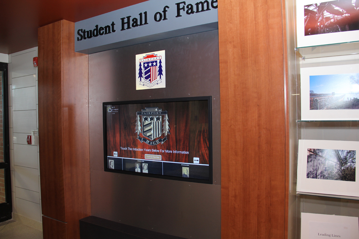 Interactive Hall Of Fame, Interactive Solutions, Wall of Fame, Interactive Wall of Fame, Touch Hall of Fame, Digital Yearbooks, Digitize Yearbooks, Cloud Based Software, Trophy Case Enclosure, Custom Enclosure, Touch Wall, Digital Hall of Fame, Interactive Digital Trophy Case, Sports Awards, Touchscreen, Digital Wall of Fame. Graduation Honors, Championship Team Banners, Veterans Wall of Honor, College Wall of Fame, High School Wall of Fame, College Hall of Fame, High School Hall of Fame, Veterans Hall of Fame, Veterans Wall of Fame, Digital Donor Recognition Wall, Hall of Distinguished Alumni, Digital History Wall